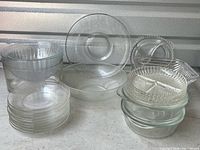 Group shot of all glass dishware pieces