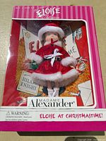 Front view of boxed Madame Alexander Eloise at Christmastime doll and book