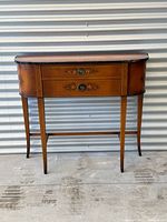 Front view of curved Deilcraft console table