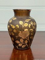 Full view of amber glass vase front