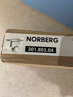 Box corner with NORBERG label and model number 301.805.04