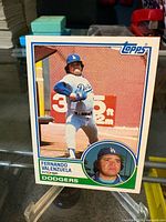 Front view of card showing action photo, inset portrait and Topps branding