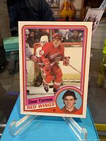 Front of 1984 Topps Steve Yzerman rookie card on stand