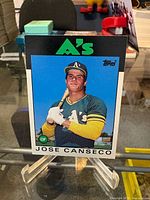 Front view of Jose Canseco card on stand