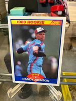 Front of 1989 Score Randy Johnson rookie card on stand