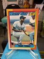 front view of Frank Thomas rookie card on stand