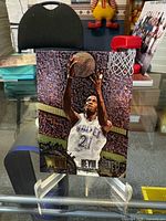 Front view of Kevin Garnett Fleer Metal rookie card in holder