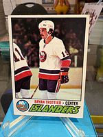 Front of Bryan Trottier Topps #105 card on stand