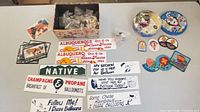 Full lot overview showing patches, stickers, tin, pins, hardware in open box
