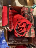 Box top view showing multiple insulated bags and wire basket