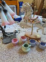 Group shot: carousel horse, lily lamp, six miniature pitchers