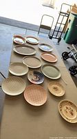 All plates laid out on table showing variety and count