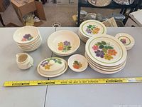 All pieces laid out with measuring tape for scale
