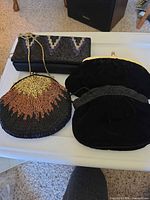 Three clutches laid out showing overall styles and sizes