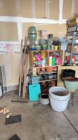 Overall view of planters, tools, supplies and shelving