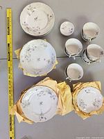 Group shot showing all dinnerware pieces laid out on table