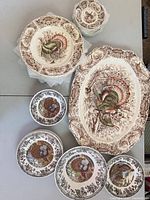 Top view of entire dinnerware set showing platter, plates and bowls