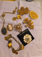 Group shot showing all jewelry pieces laid on cloth