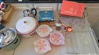 Overall lot view showing all kitchenware pieces grouped