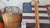 All three baskets showing picnic basket with flag lid, bushel basket and wire egg basket