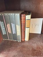 Full lot showing slipcased Dickens set and two standalone books