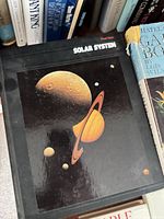Cover of Solar System hardcover showing planetary imagery
