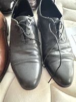 Black lace-up oxford pair front view