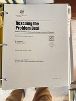 Cover page of Rescuing the Problem Deal manual in 3-ring binder