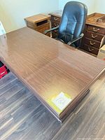Front view of dark brown executive desk