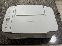 Top view of Canon PIXMA printer closed
