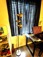 Full view of floor lamp, shades off, base visible