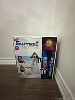 Front of sealed Sumeet Traditional Domestic DXE mixer grinder box showing product image and specifications