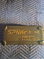 Top view showing SPNKr and Halo 3 graphics on olive case