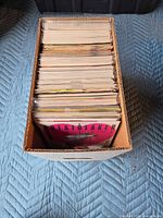 Top view of full long box showing packed comics