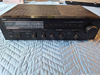 Front angled view of Yamaha R-3 receiver showing overall condition