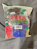 Front view of sealed Coopay bag showing assorted colored chips inside