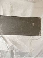 Full view of black rectangular acoustic panel