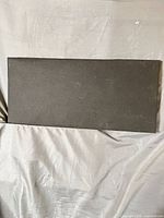 Full view of rectangular black acoustic panel