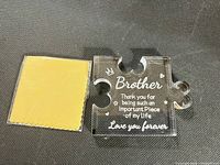 Acrylic plaque and microfiber cloth on surface