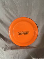 Top view showing orange disc and black Atlanta Harley-Davidson Georgia logo