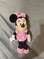 Front view of Minnie Mouse plush showing overall appearance