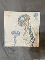 Front view of the square canvas showing jellyfish illustration