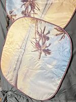 Front view showing both connected panels with tropical print