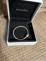 Bracelet in Pandora box showing interior branding
