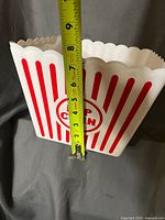Tape measure showing tub height ~7 in