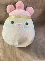 Front view of Squish-Doos Beebz plush showing facial features and color pattern