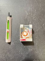 Front view of BB-8 box and lightsaber blister pack