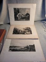 All three unframed prints laid out