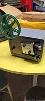 Projector front view with reel attached