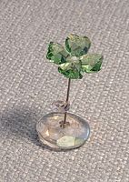 Front view of Swarovski rocking shamrock figurine